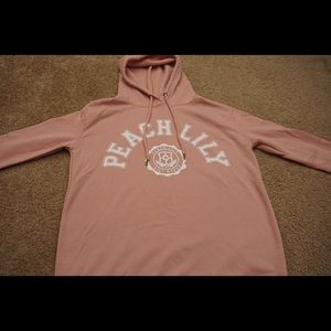 Pink ‘Peach Lily’ hoodie by T•I•M•I•N•G
